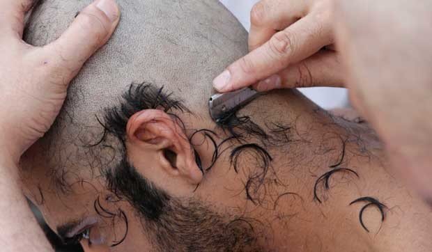 Hair cutting and completion of Umrah